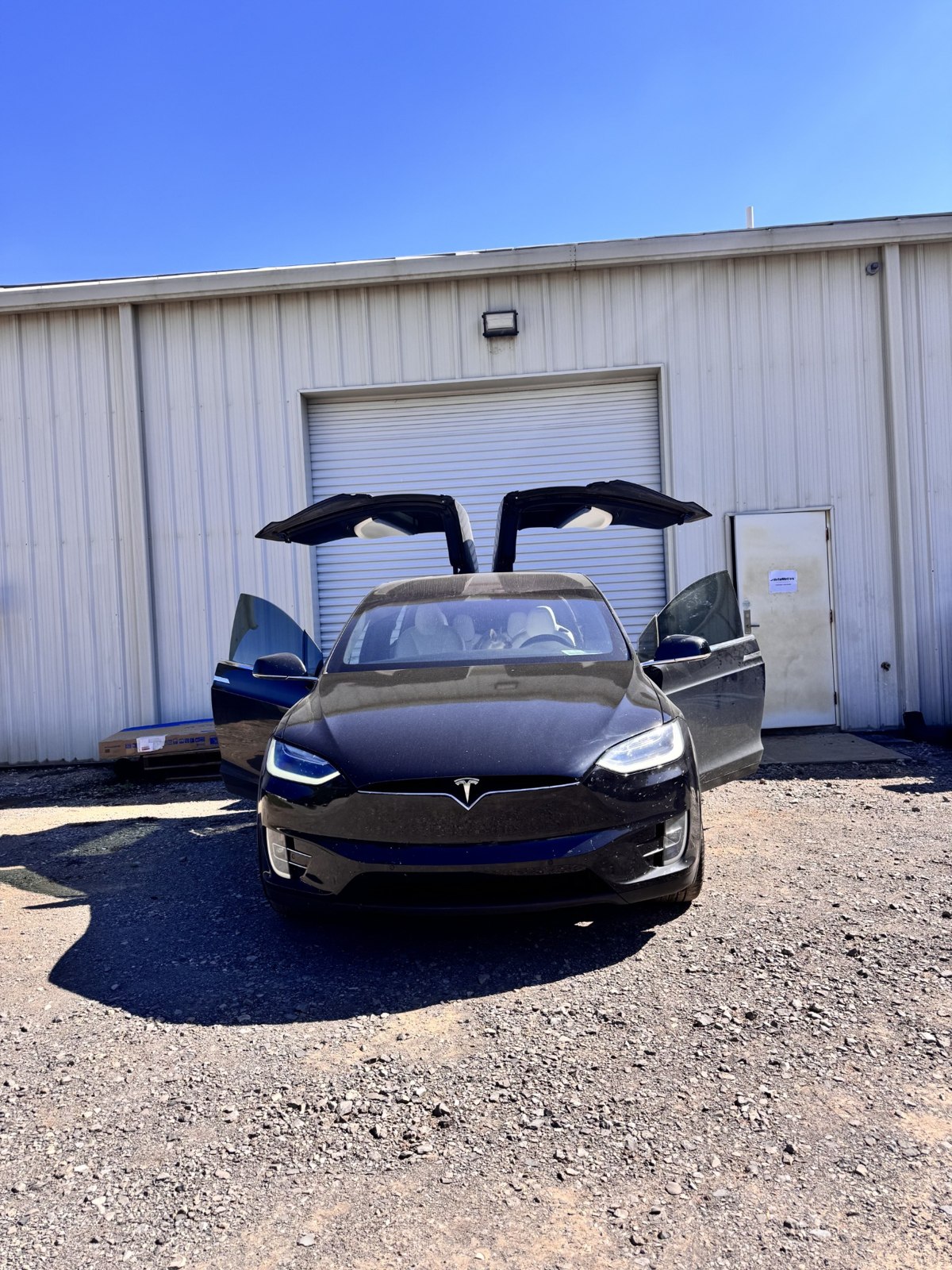 Front with falcon-wing doors open